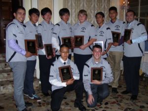 2011 SFP J.V. Team with assistant coaches display their C.H.S.A.A. Championship Polos and 1st Place Plaques at the Awards Dinner on July 20, 2011.