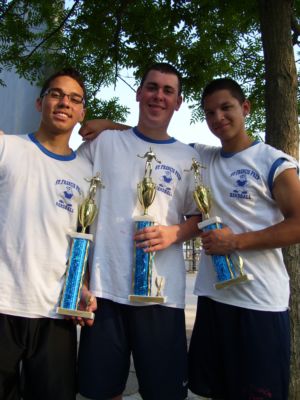 Given only a few hours notice of the 2011 All-Star Tournament held at Orchard Beach on June 7, Chris Owen (middle) teams with 2nd Doubles teammate Louis Pierre Martinez (left) to win 1st Place. Captain Kenneth Franco scrambled to have a co-worker cover his work obligation and won 2nd place in the Singles Division. It was an amazing achievement for all involved given the circumstances under which they were placed.